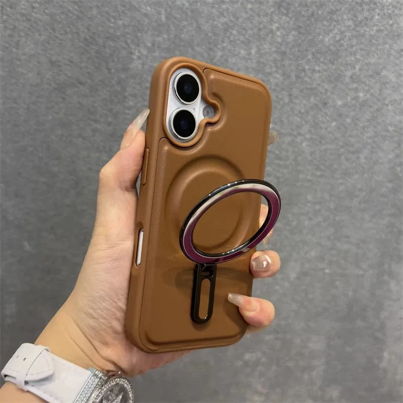 适用iPhone16PROMAX皮革磁吸手机壳苹果16E金属支架15防摔保护套