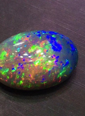 47.54克拉天然变彩黑欧泊戒面裸石椭圆形晶体干净满火彩Opal珠宝