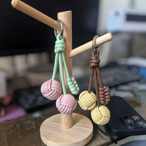 适用于迪桑娜包包挂件樱桃钥匙扣挂饰高档皮革编织球创意礼物