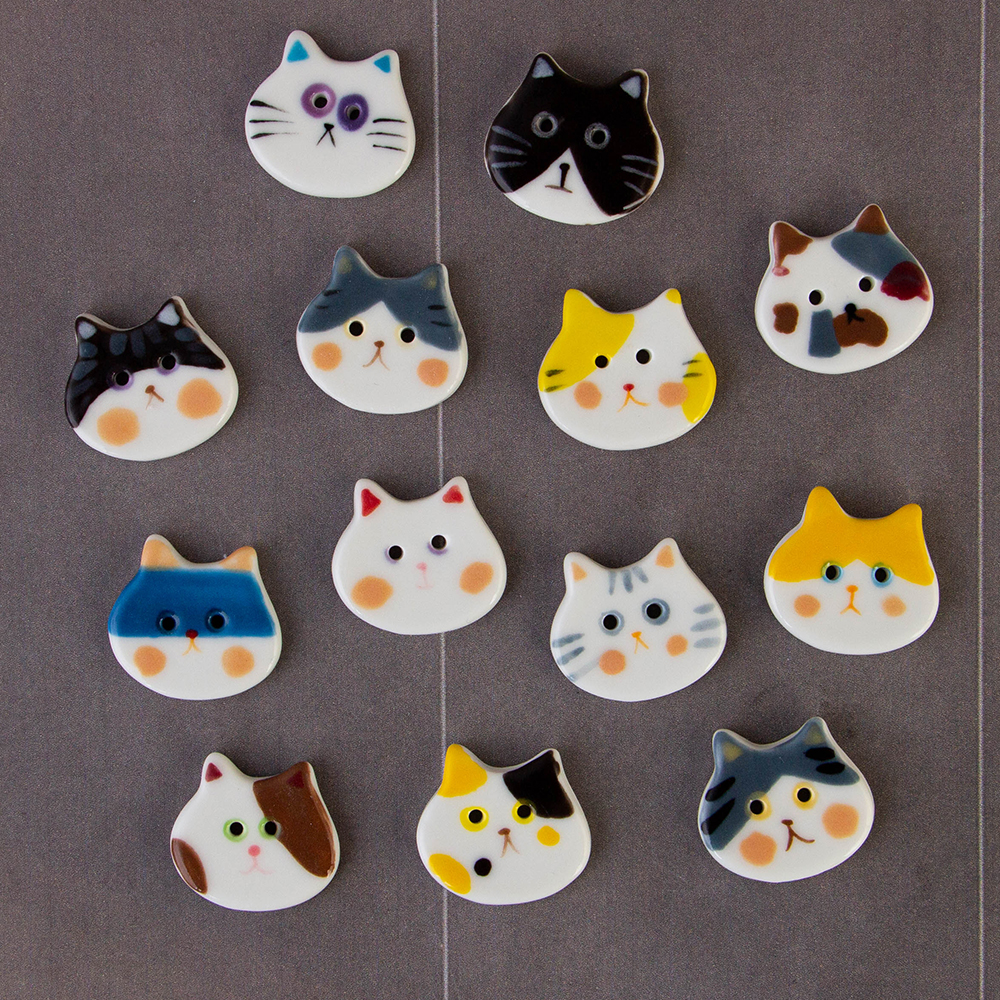 25mm胖胖猫咪陶瓷纽扣子DIY手工复古特色高档服饰青花两双孔风衣