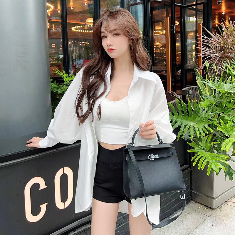 卡卡《时尚杂志》羊腿袖白衬衫女