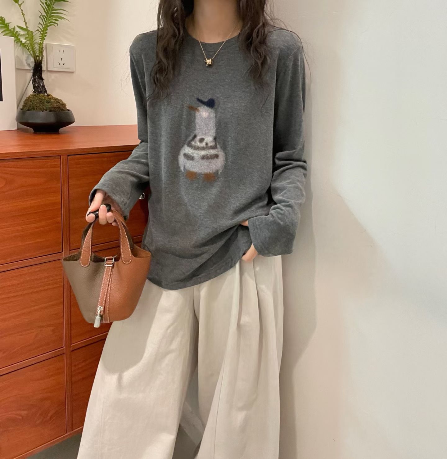 欧洲站2026秋季新款女装韩版圆领卡通图案针织衫女宽松长袖T恤女