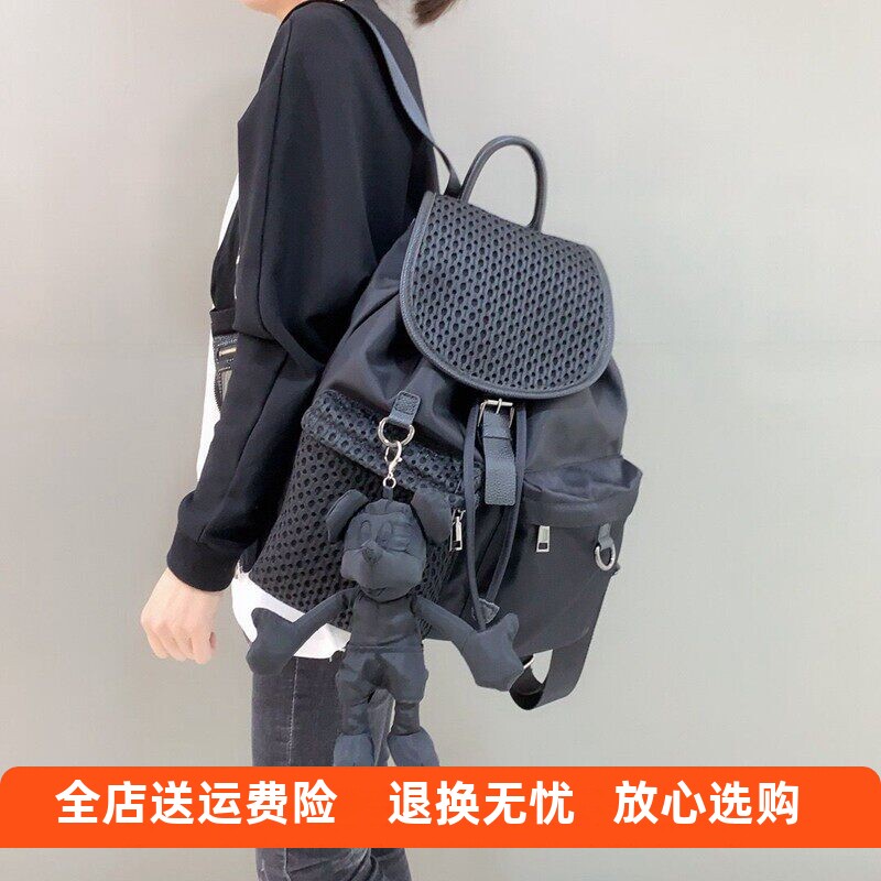 欧美时尚牛仔布复古双肩包个性抽绳翻盖背包实用多口袋包包带挂饰