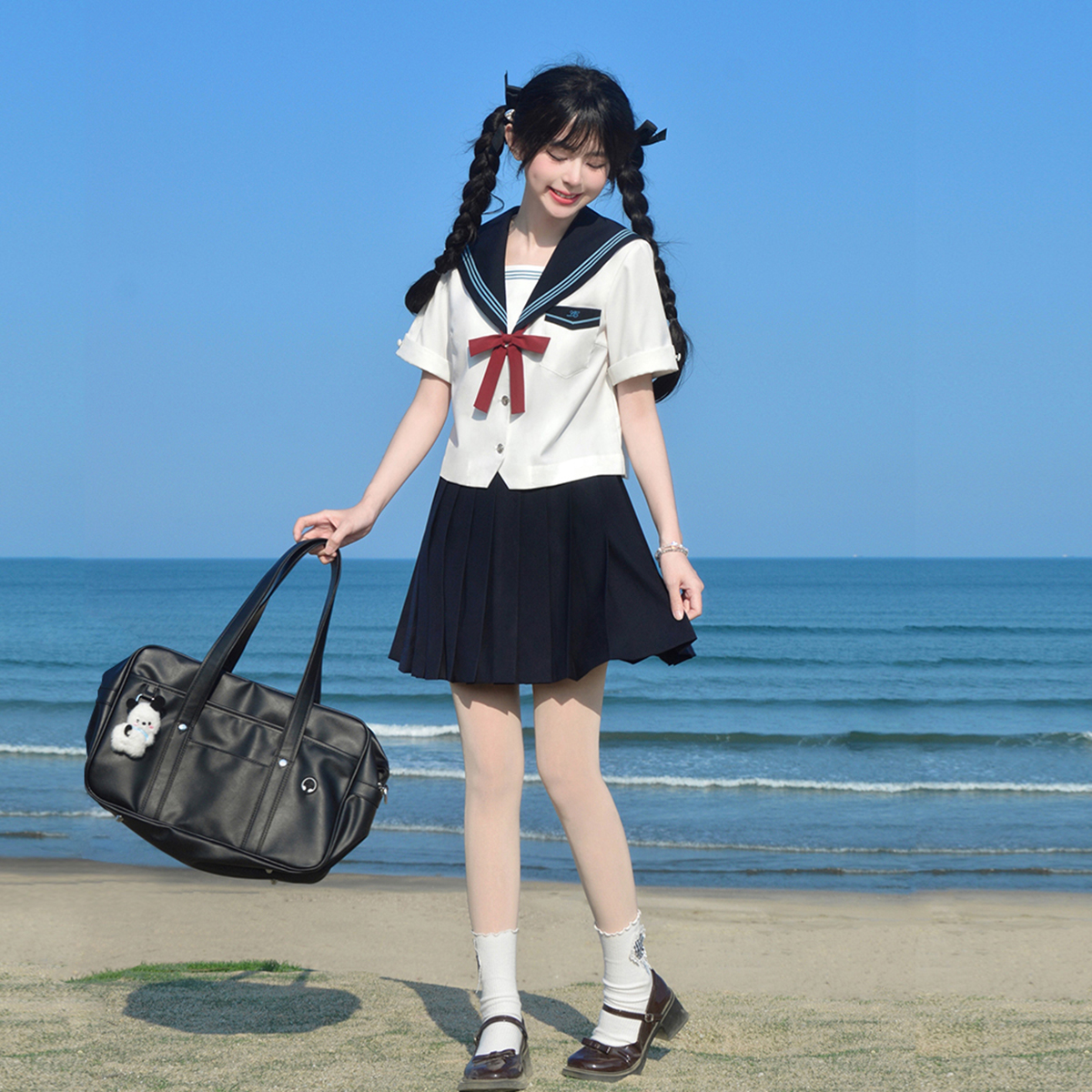 鹤良高等校供感绀碧色水三本手服