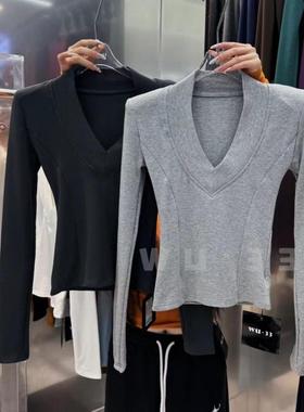 wu.33韩版冬季新款气质显瘦磨毛设计感v领长袖正肩T恤打底衫上衣