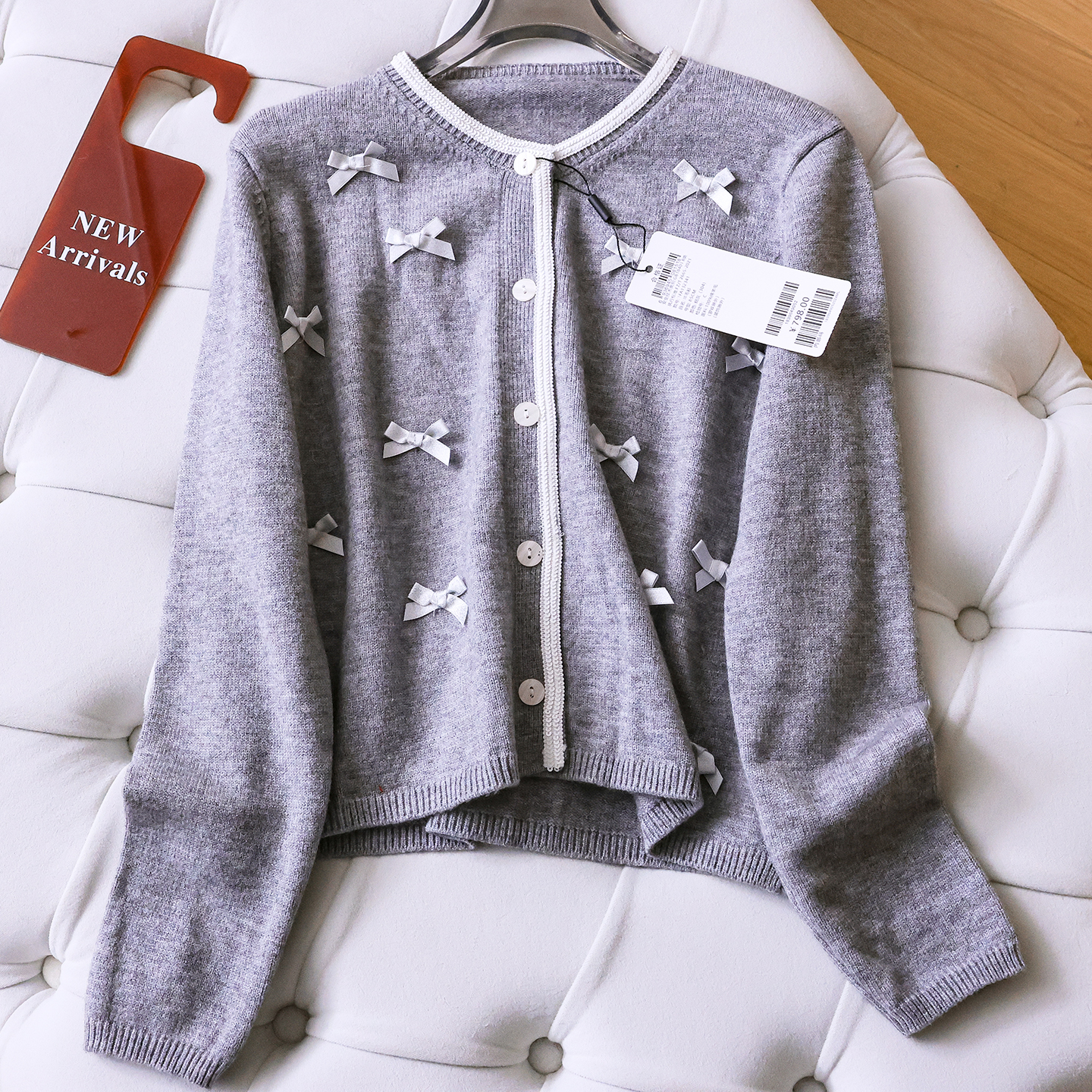 甜美风蝴蝶结亮片装饰圆领毛衣女