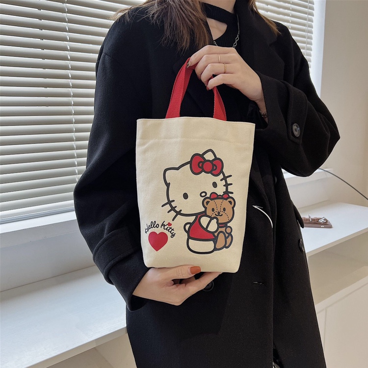 HelloKitty加厚手提小帆布袋保温水杯袋焖烧杯套上班手拎零食女包