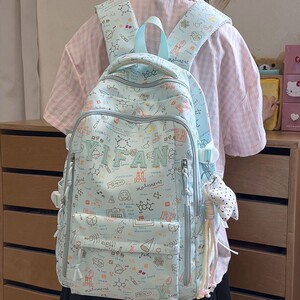 韩版ins卡通可爱小狗双肩包包女大容量童趣甜美涂鸦百搭学生书包