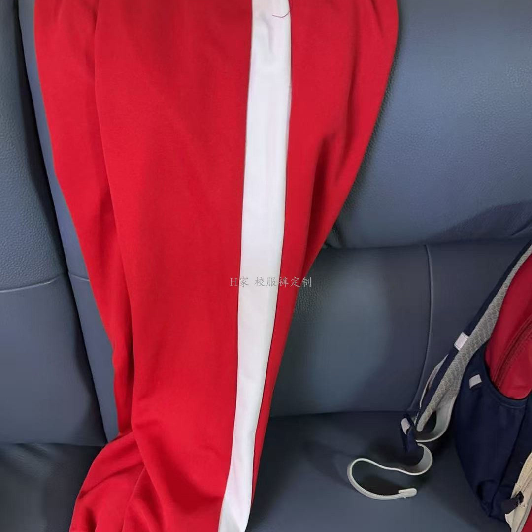 订做宁江区民主小学四季红色校服运动裤子侧边拼白条束口加绒班服
