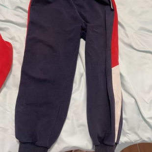 鹿邑县第二实验小学来图定制藏蓝色侧边拼接红白四季校服束口裤子