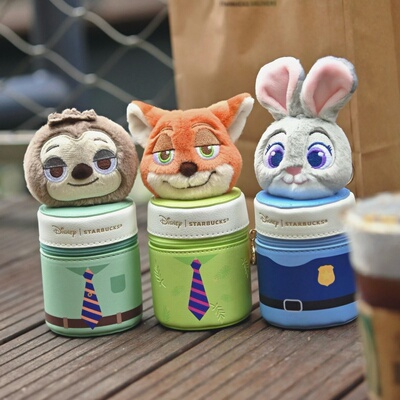 星巴克迪士尼联名疯狂动物城系列尼克朱迪挂件包毛绒公仔耳机包