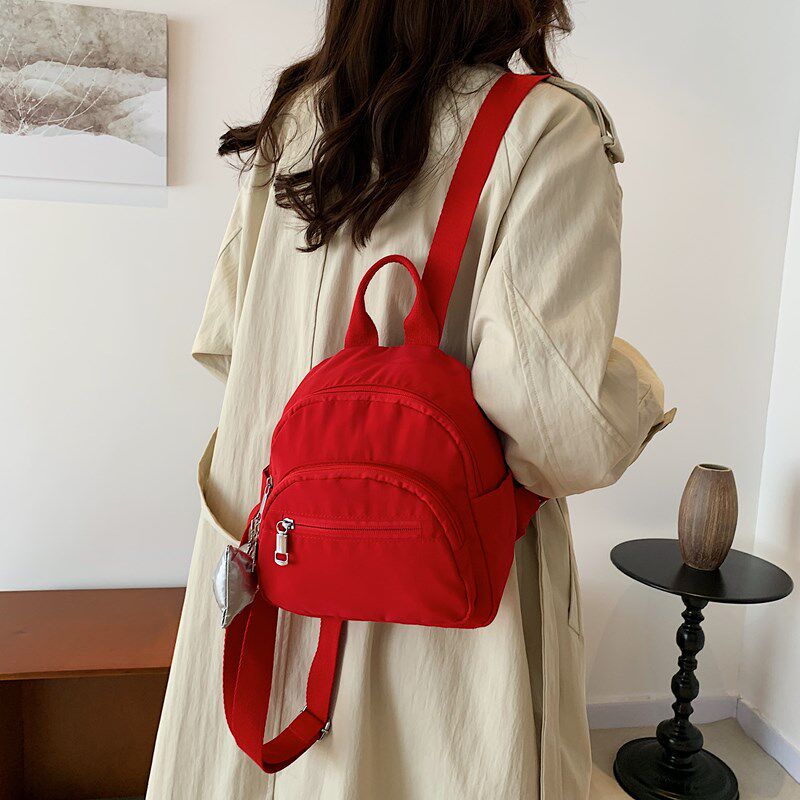 迷你款休闲通勤百搭逛街小双肩包女轻便尼龙中国红色小包包女洋气