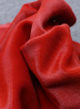 意大利正红色胎牛毛皮毛一体真皮皮料，厚度：1mm左右，手感：软
