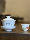 В 1980-х годах чайный дом Xiangxing Tea House выпустил старинную фарфоровую чашку с золотой рыбкой, расписанную вручную, и чашу с крышкой, чайный сервиз Чаошань Кунг-фу, сервиз с ручной росписью mini 2