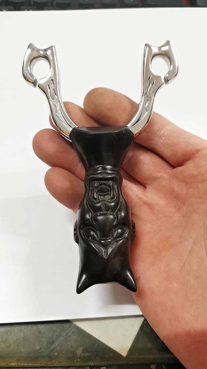 传统弹弓紫光檀和不锈钢304结合手工自己作。