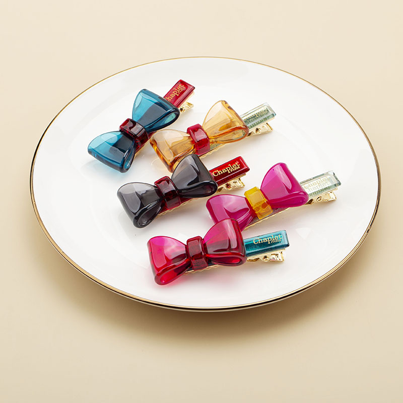 亚力山大同款发饰蝴蝶结边夹