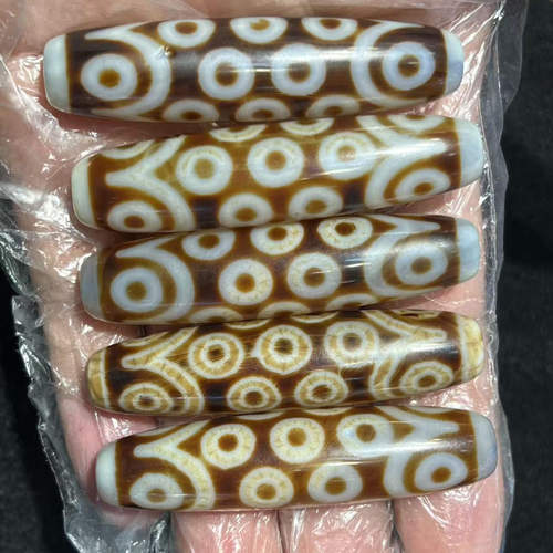 60mm牙黄21眼图案玛瑙天珠