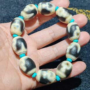 仿纯系黑白钙化奶黄皮老料台湾工艺宝瓶达洛天珠手串批发