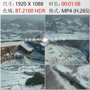 航拍吉林松岭雪村冬天积雪覆盖绿皮火车旅游开发高清实拍视频素材