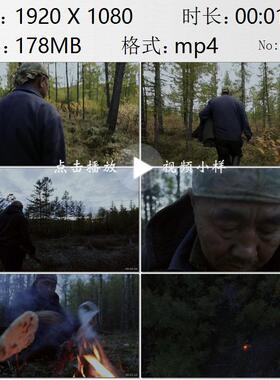 内蒙古鄂温克族牧民独自在山林中寻找驯鹿夜晚篝火露宿视频素材