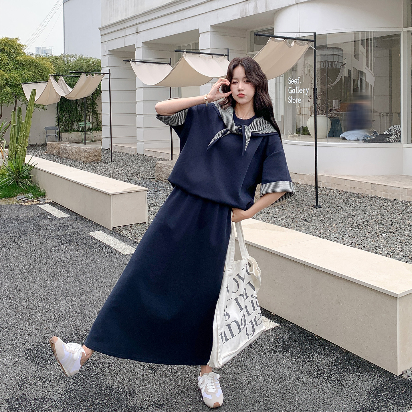 学院风深蓝色条纹拼接卫衣套装女夏季2026新款复古风半身裙两件套