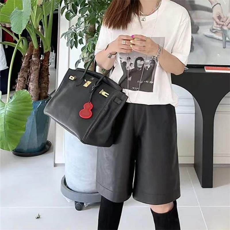 普洛克正品 春秋超修身显瘦小鸟腿A级弹力皮裤子绵羊真皮九分女裤