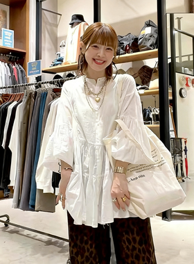 日系妮蔻+2026春季甜美风伞摆灯笼袖不规则上衣纯色衬衫女