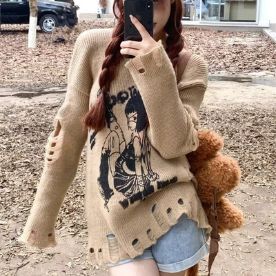慵懒风破洞涂鸦印花长袖毛针织衫