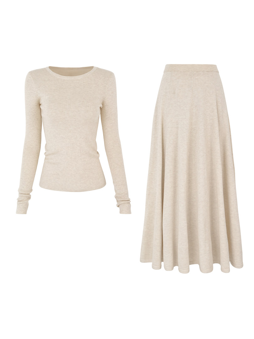 Beige long-sleeve top and matching midi skirt laid flat on white background
