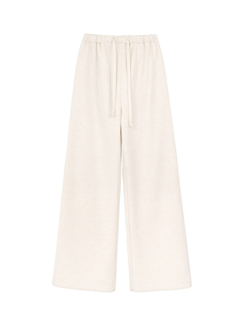 Cream-colored wide-leg lounge pants with drawstring waist