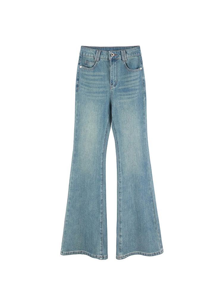 Light blue flared jeans on white background