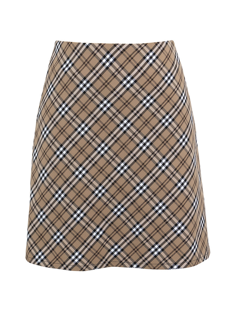 Plaid mini skirt with beige, black, and white pattern on white background