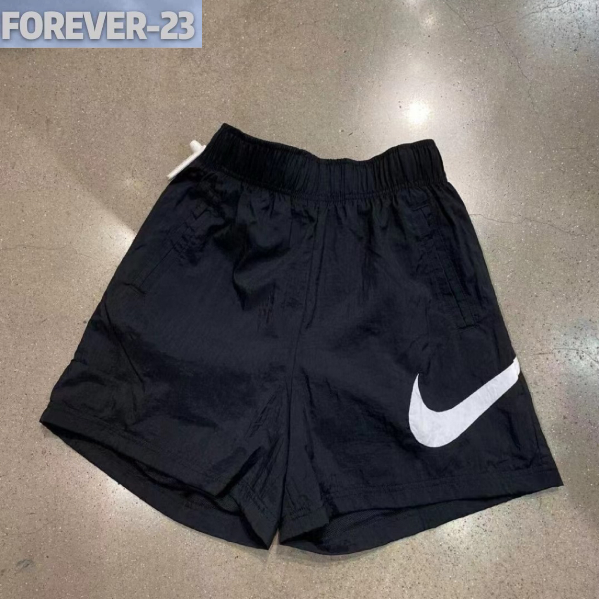 NIKE耐克女裤宽松跑步训练运动裤户外旅游沙滩裤休闲短裤DM6740