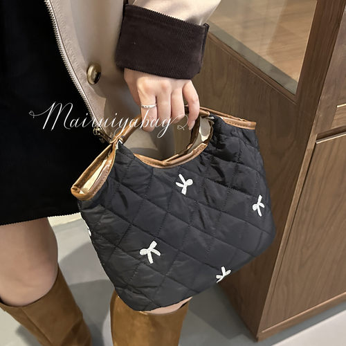 休闲菱格绣线棉服蝴蝶结水桶包