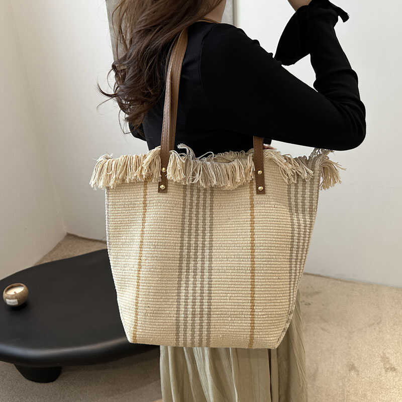 麦瑞雅韩版流苏通勤帆布托特包