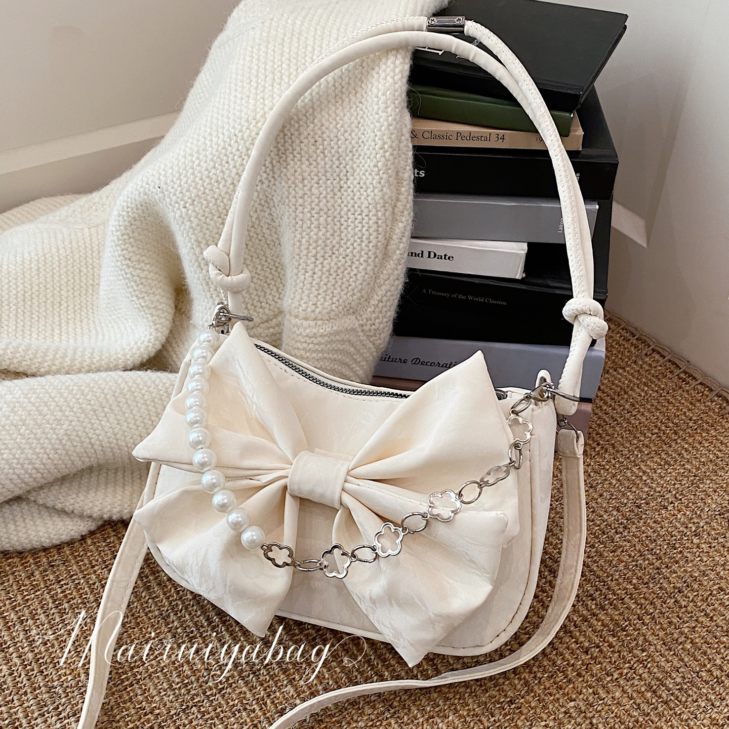 时尚简约腋下小包包女士2025新款春夏小众设计蝴蝶结手提包斜挎包