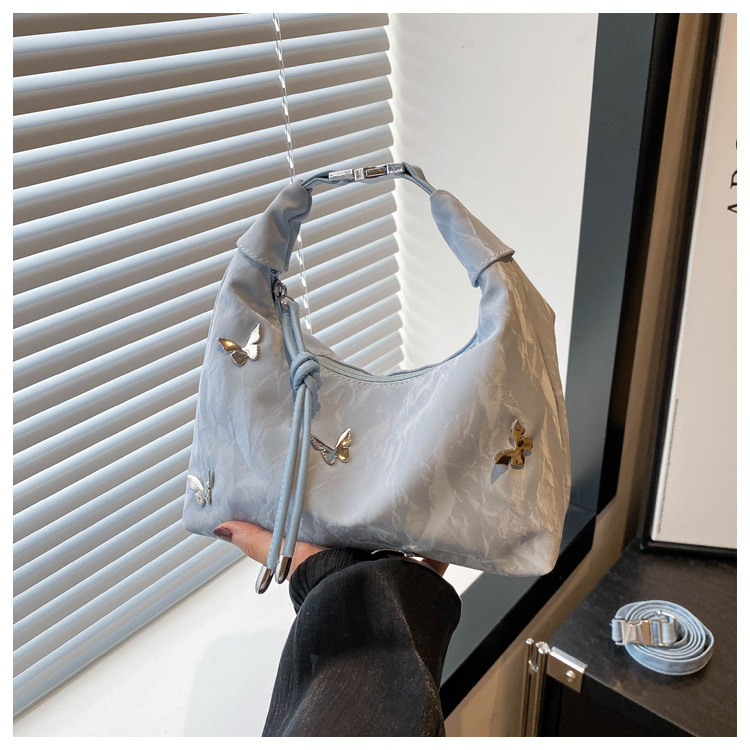 今年流行超火小包包女2024新款蝴蝶装饰斜挎包单肩腋下手提饺子包