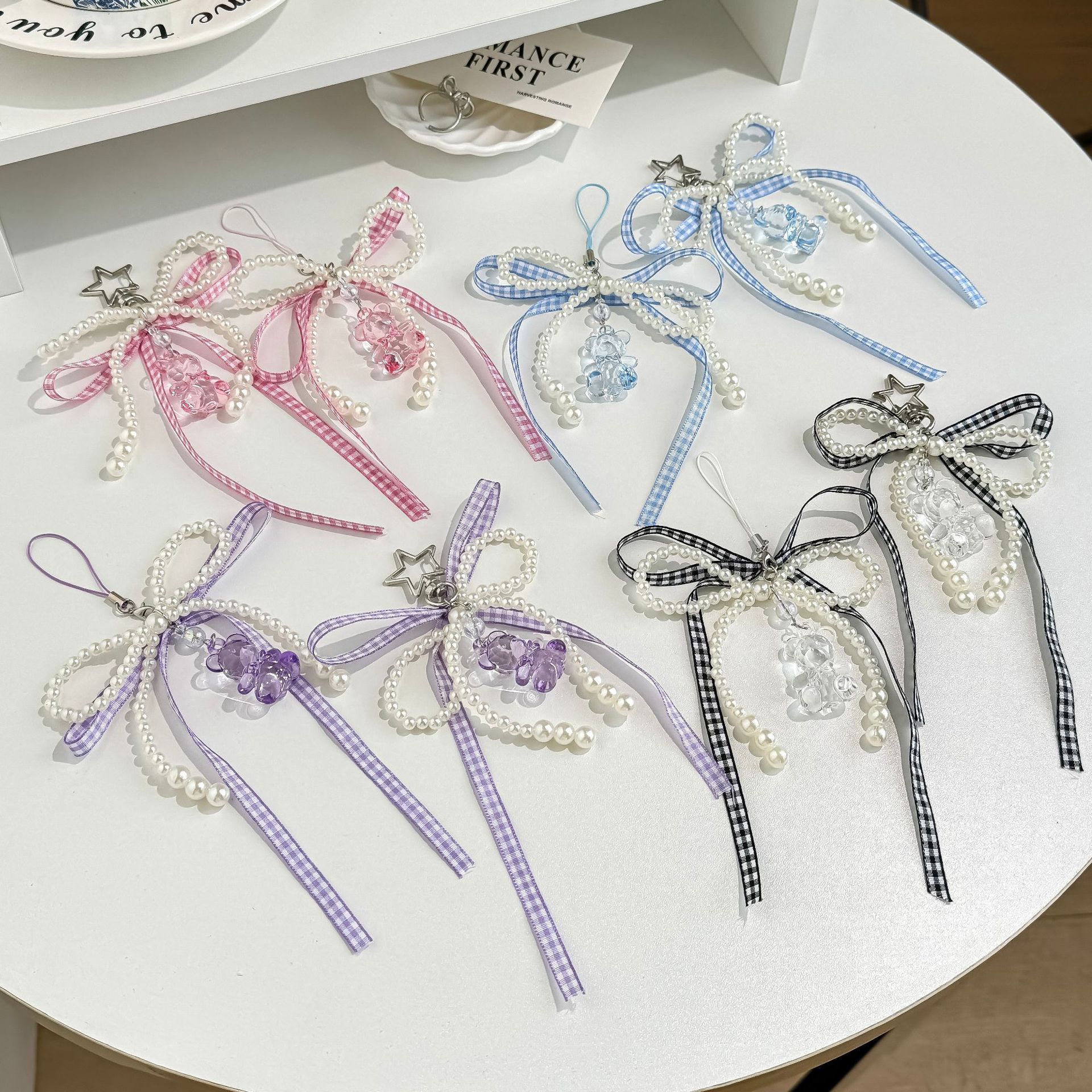 日韩系少女丝带蝴蝶结手机链可爱透色小熊包包挂饰串珠钥匙扣