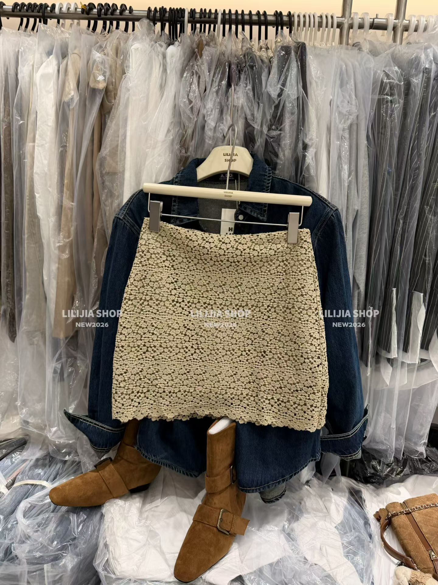 MIDO家 肌理感浮雕绣花蕾丝半身裙女2026秋季新款a字半身短裙