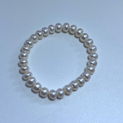 7-8mm天然白色扁圆淡水珍珠弹力绳手链松紧款手串女款无核珠