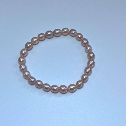 6-7mm天然粉紫色米形淡水珍珠弹力绳手链无核松紧款手串女款