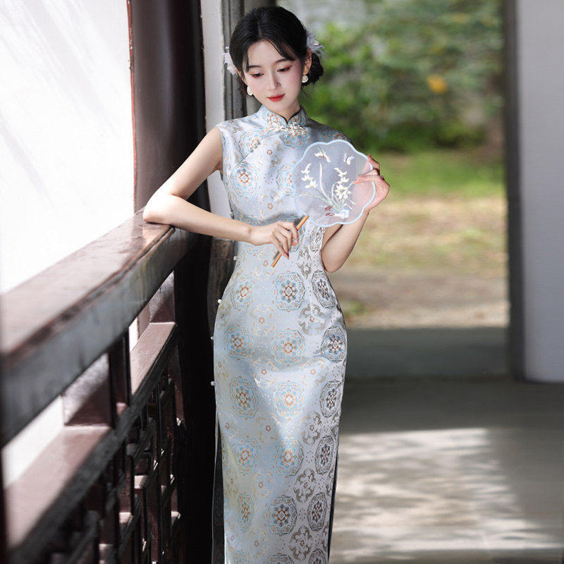 蓝色无袖新中式掐腰长款改良旗袍2026新款年轻款女上班可以穿夏季