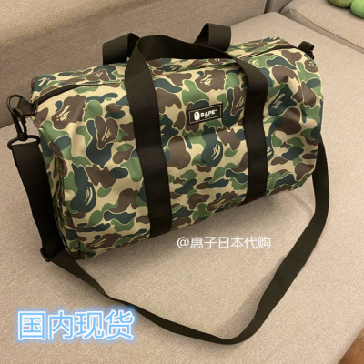 惠子代购BAPE杂志包迷彩水桶包