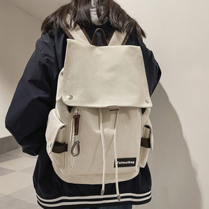 双肩包女大学生简约帆布休闲复古日系原宿ulzzang抽绳翻盖书包男