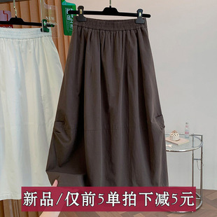 折扣春夏新款设计感独美巨好看的半身裙 松紧腰A字裙花苞裙子纯色