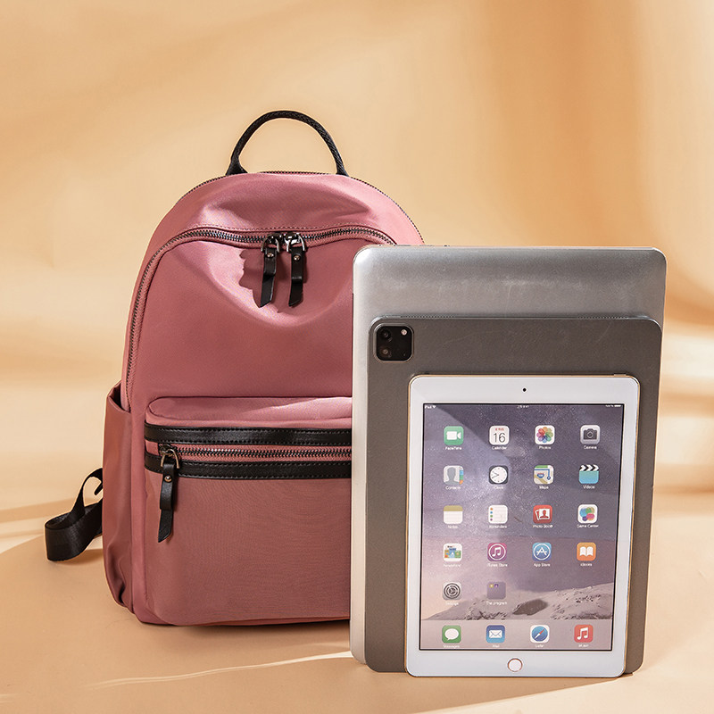 大容量背包时尚好看学生书包女士休闲旅行包红色双肩包小众百搭