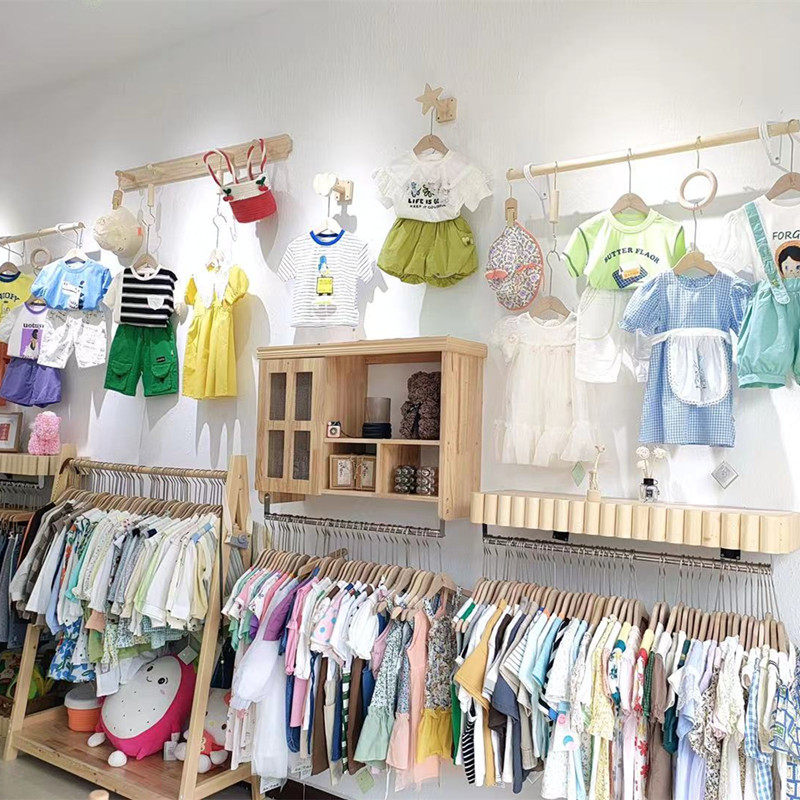 服装店墙上展示挂钩实木创意装饰点挂童装店墙面挂钩店面设计装修