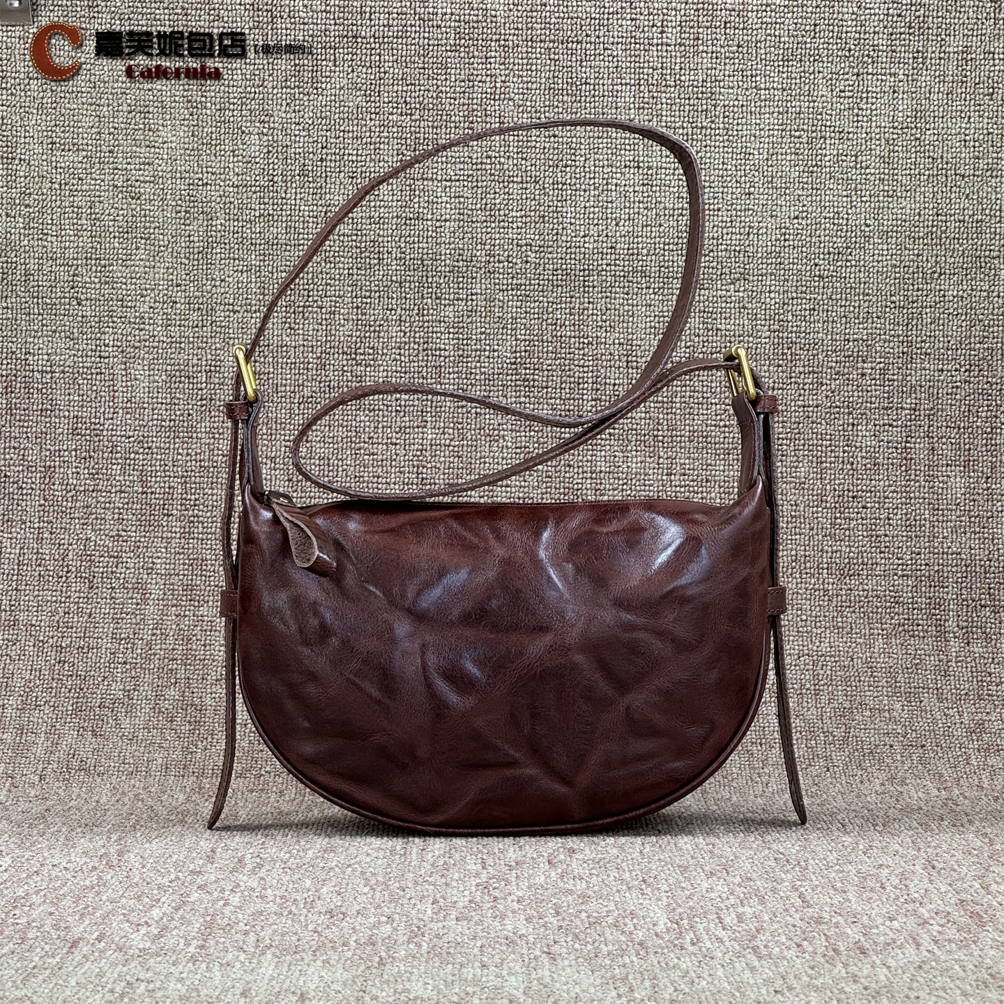 真皮斜挎包女饺子包皱头层牛皮