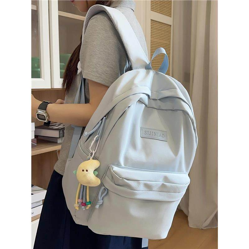 初中高中生书包女大容量双肩包休闲简约高颜值大学生上课通勤背包