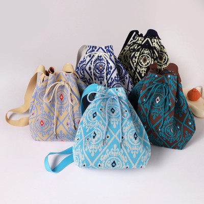 新疆特色包艾德莱斯斜挎包新款民族抽绳针织手提拎包大容量单肩包